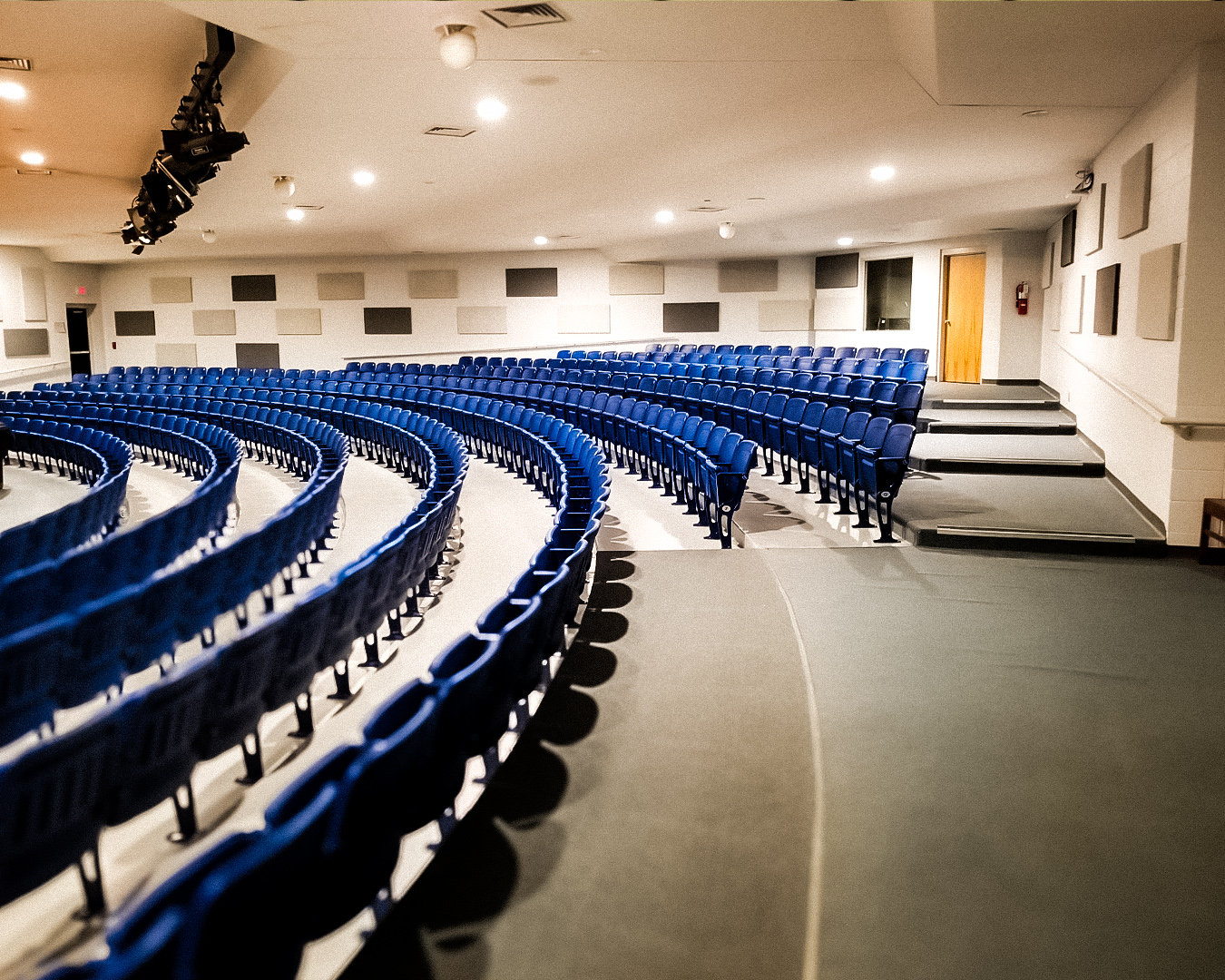Acoustic Panels in an Auditorium Sound-absorbing acoustic panels in a lecture hall.