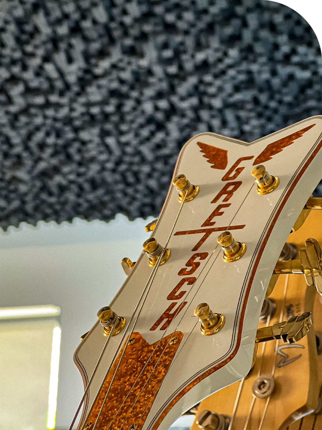 Gretsch Guitar Against Audimute Strata CityScape Ceiling